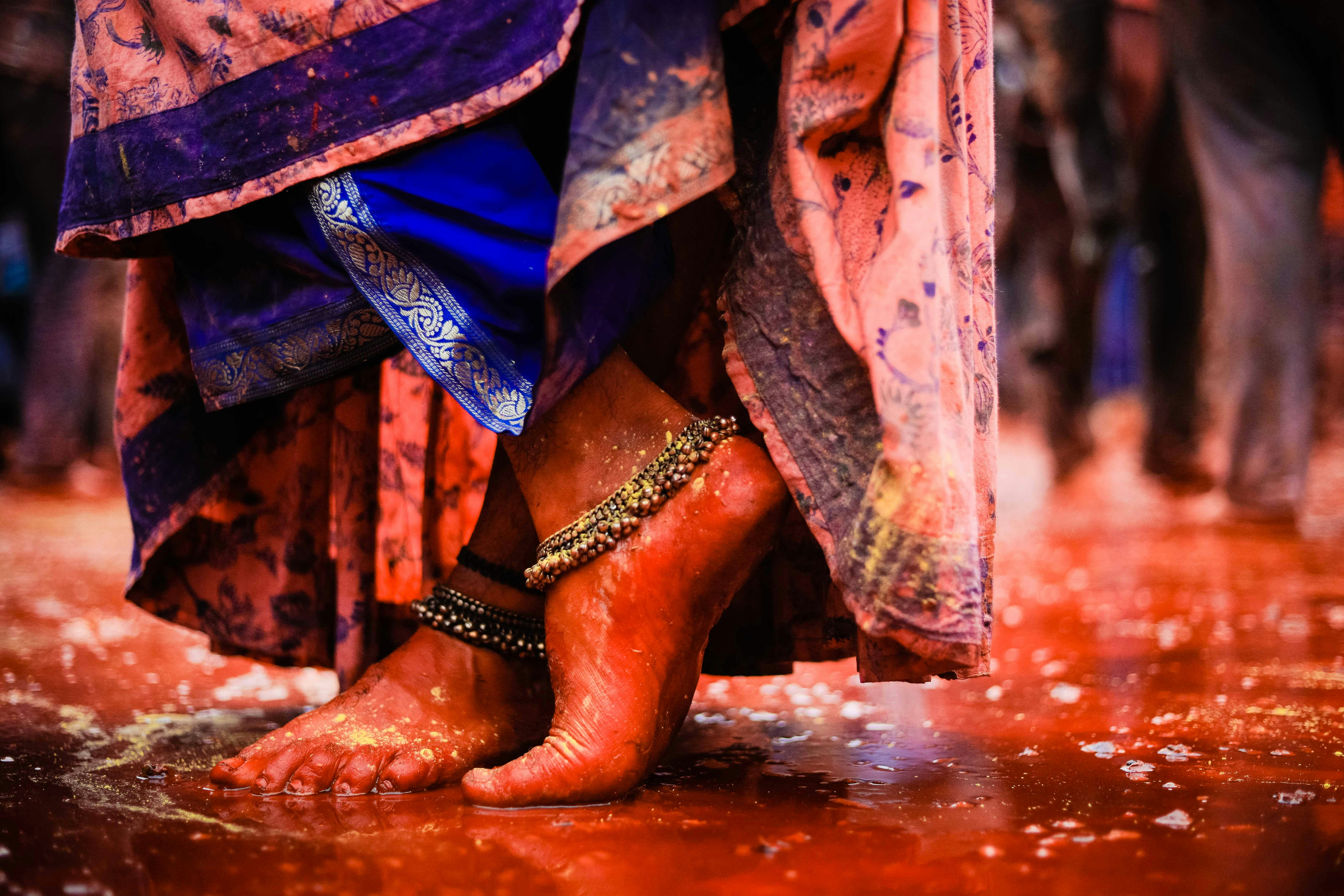 person wearing brown leather boots